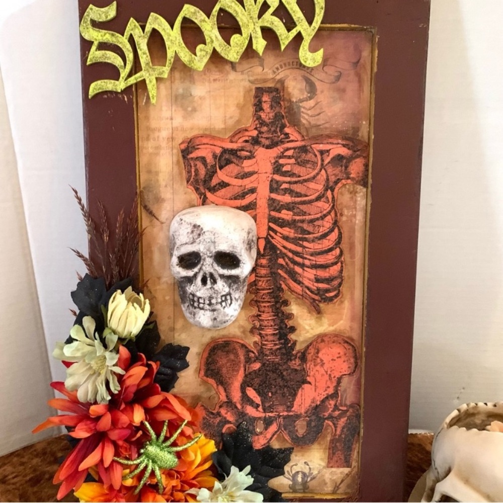 "Spooky" skeleton wall art with floral accents. - Picture 2 of 9